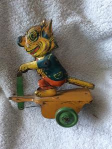 tin Felix on scooter